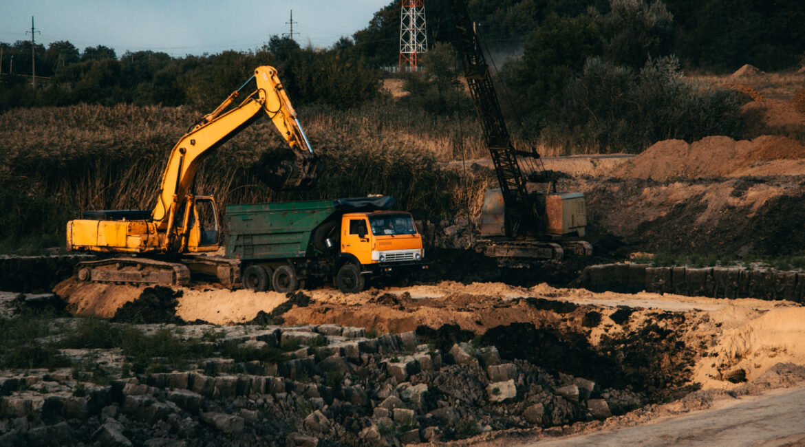 closeup shot ongoing construction with tracks bulldozer abandoned land